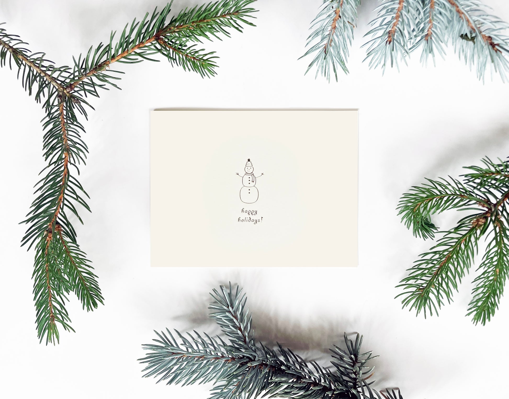 Snowman Hug Greeting Card - Studio Portmanteau