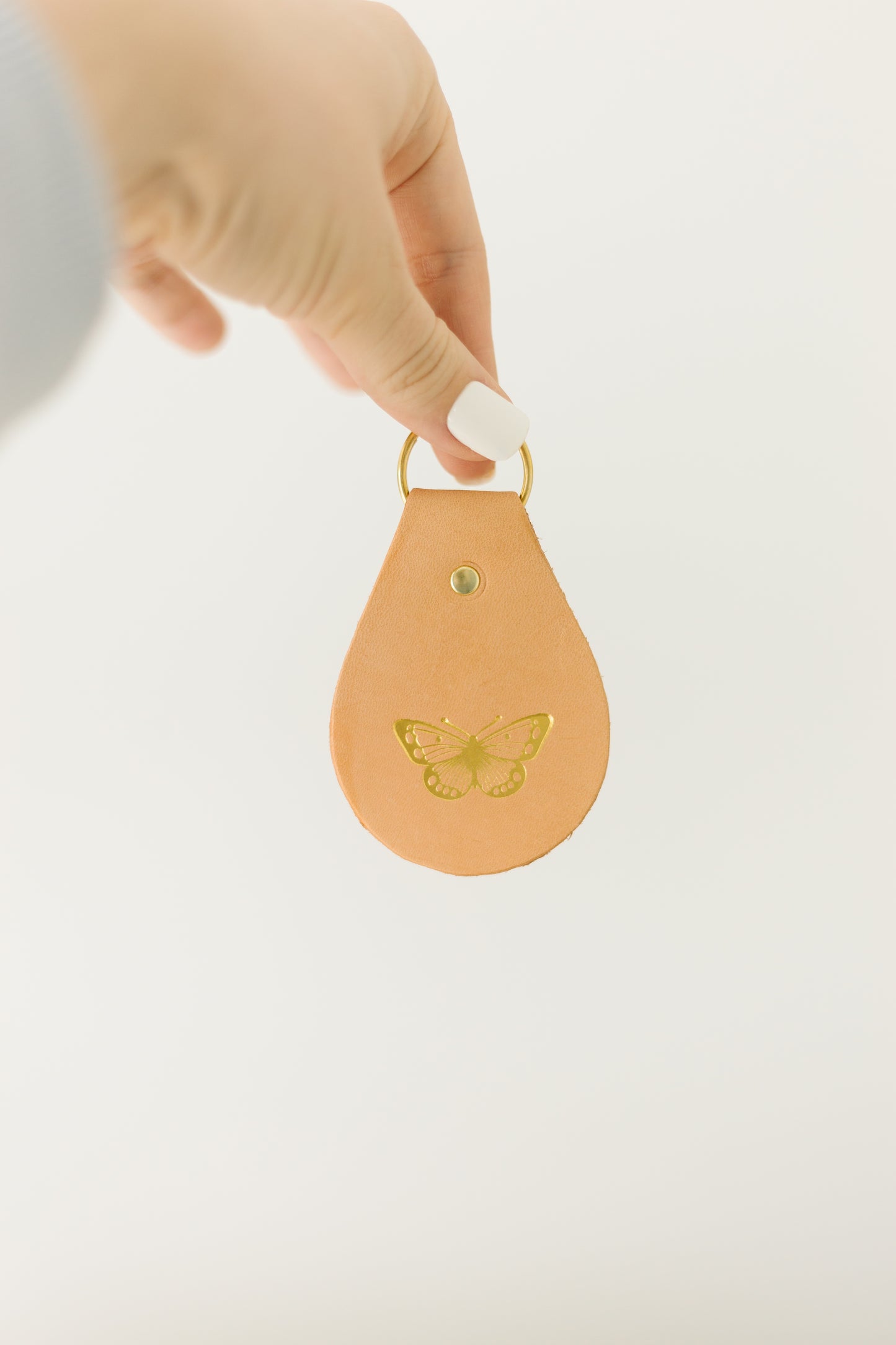 Embossed Tiny Treasure Leather Keychain