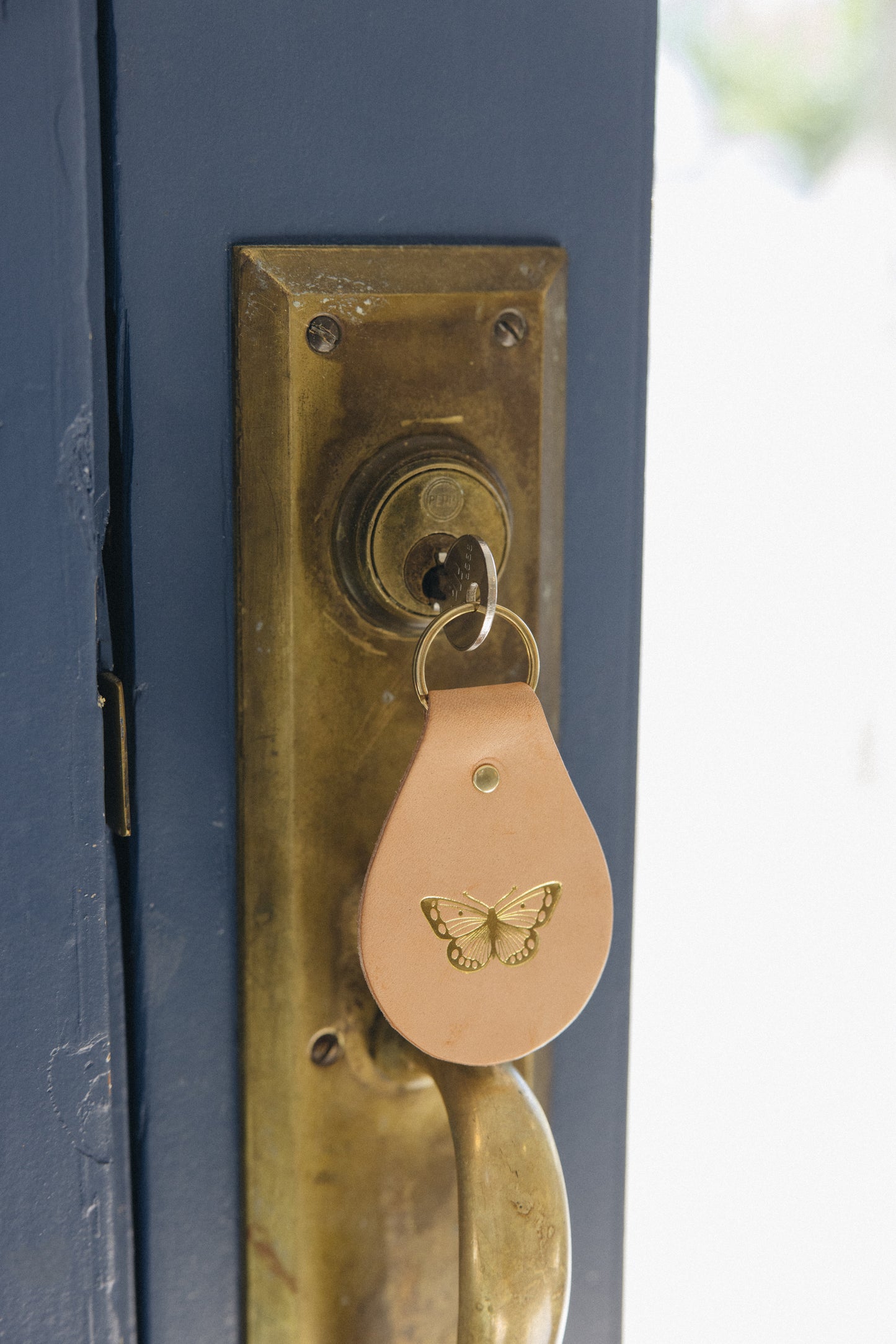 Embossed Tiny Treasure Leather Keychain