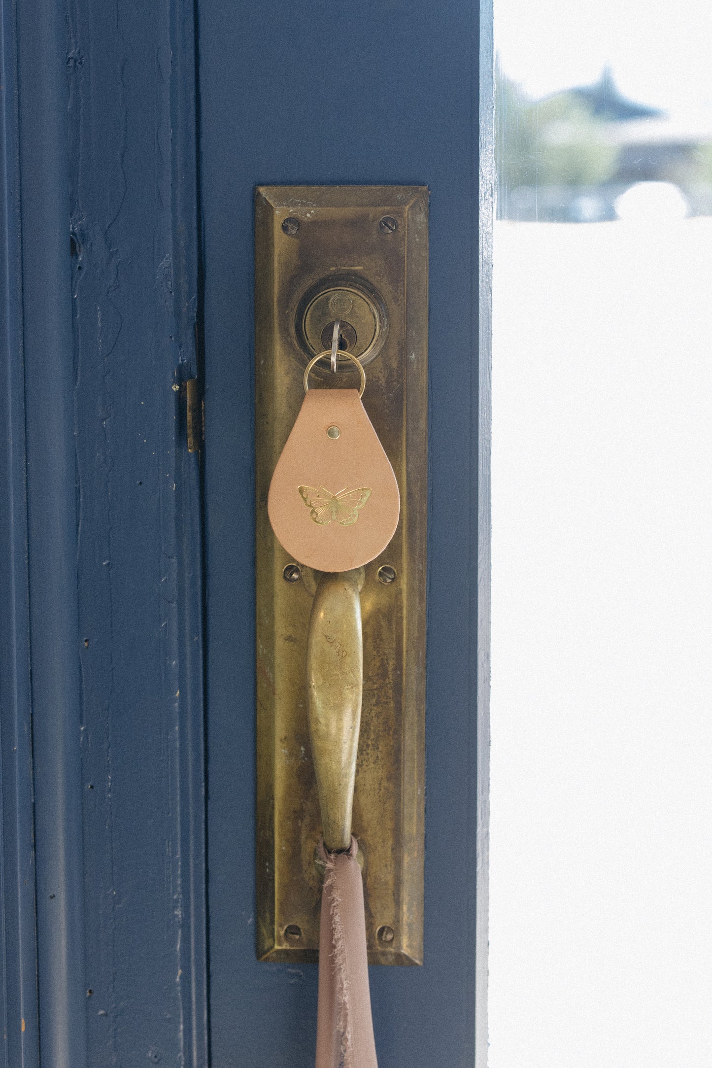 Embossed Tiny Treasure Leather Keychain