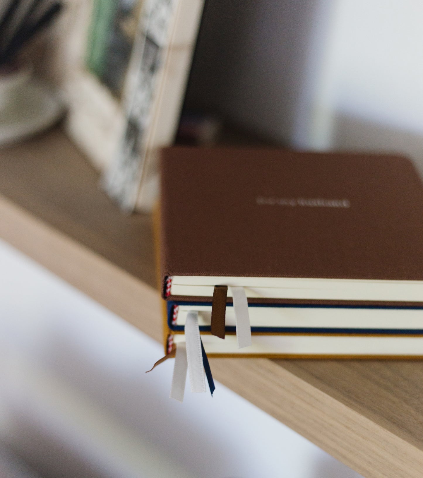 Custom Logo Foil Embossed Square Linen Notebooks | Navy & Browns